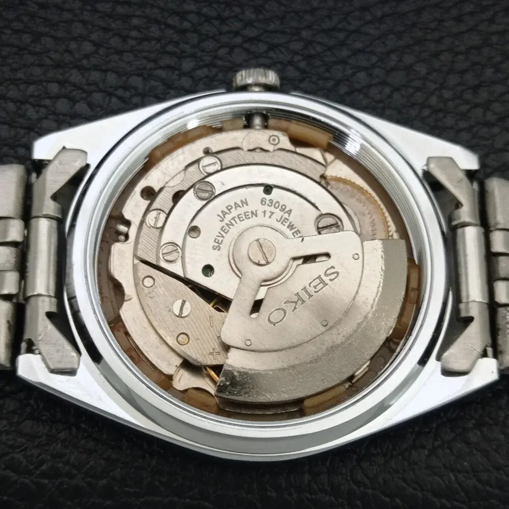 Vintage 1973 Seiko Automatic Mens Silver Watch W/daydate & Silver Accents